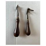 2 Osborne leather hand tools