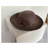 Brown straw hat with feather, Erick Javits