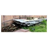 Stack of Tin and Fencing T-Posts