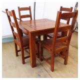 Solid and Heavy Wood Table and Four Chairs.