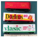 Three (3) 7' Plastic Train Cars incl. Vlasic,