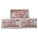Three (3) 100 Thai Baht Notes featuring
