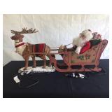 Large plastic Santa with sleigh and reindeer