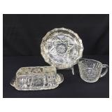 Cut glass ashtray, butter dish and cream pitcher