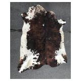 Animal hide throw rug