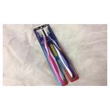 Twin pack toothbrushes