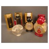 Lot of 9 used Perfume Bottles: (8) Cartier and (1)