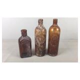 3 Vintage Amber Whiskey Bottles