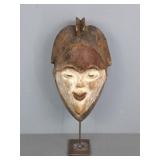 African Punu Mukudj Mask On Stand African Punu Mukudj Mask On Stand