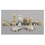 9x The Bid  Small Carved Stone Folk Art