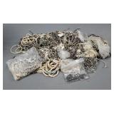 Pile Of New Old Stock Shell Necklaces.