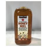 KIRKLAND LIQUID  HONEY 3 KG BOTTLE TOP IS CAVED