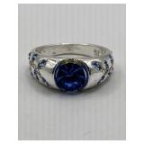 SILVER TONE COSTUME RING WITH BLUE RHINESTONES -