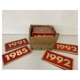 LARGE BOX OF VINTAGE CAR DEALER YEAR PLATES