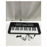 ELECTRIC KEYBOARD SIZE 20X8 IN