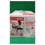 SKIP HOP CONVERTIBLE HIGH CHAIR