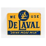 WE USE DE LAVAL 'DRINK MORE MILK' TIN SIGN