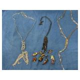 Assorted Pins and Silver-tone Necklaces