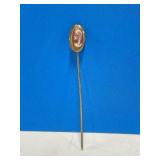 Goldtone Metal Stick Pin with an Oval Carved H