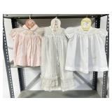 3 Newborn Outfits with Hangers