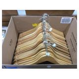 quantity of wooden clothes hangers