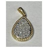 14 kt Gold Pear Shaped Pendant Featuring Diamond