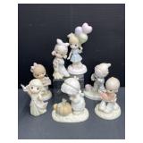 7 Precious Moments Figurines