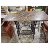 Marble slab on antique sewing machine base