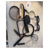 Magnifying glasses, paper weight, glasses, cufflinks