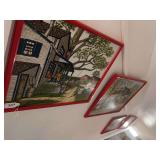 4 red framed pictures going down wall to basement on left side all signed by H. Hargrove