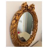 27” oval gold frame mirror