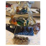 Vanity mirror , vintage Avon peacocks and bird of paradise cologne bottles , glasses , and vintage lipstick holders