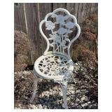 2 metal patio chairs w/ rose back design