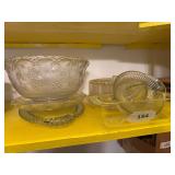 Glass juicer, plastic punch bowl, glass egg plate, plastic covered plate, glass tray