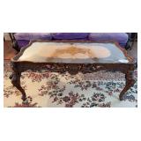 Carved wood coffee table with protective glass 38" x 17" x 20"