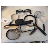 Magnifying glasses, paper weight, glasses, cufflinks