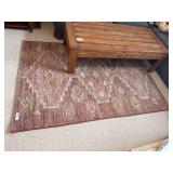 Burgundy, yellow, beige area rug 49' x 72'