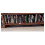 Bottom shelf of books