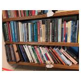 Bottom 2 shelves of books