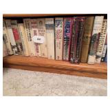 Bottom shelf of bookcase