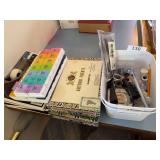 Notebooks, pill organizers, cigar boxes, tape measurer