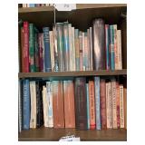 Middle 2 shelves of books