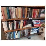 Bottom 3 shelves of books
