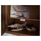 Military canteen, toy plane (has some damage), plane pictures