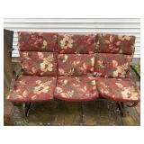 Glider with cushions