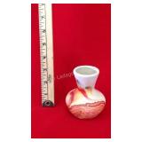 Nemadji Pottery Vase
Red, Orange swirl