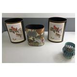 Three Trash Bins and Candle Lamp