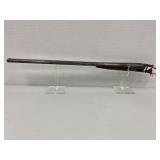 Double Barrel Side by Side shotgun. No visible