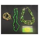 Green beaded necklaces and bracelet