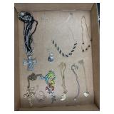 Necklaces including religious items